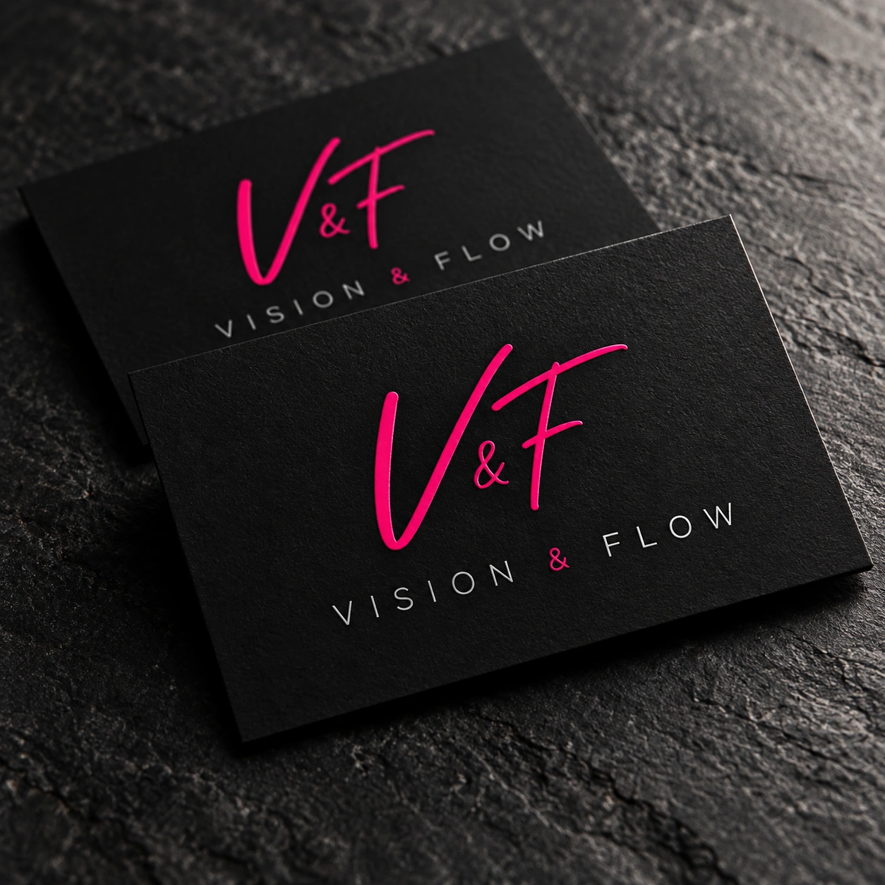 Schwarze Vision & Flow Visitenkarten mit pinkem Markenzeichen